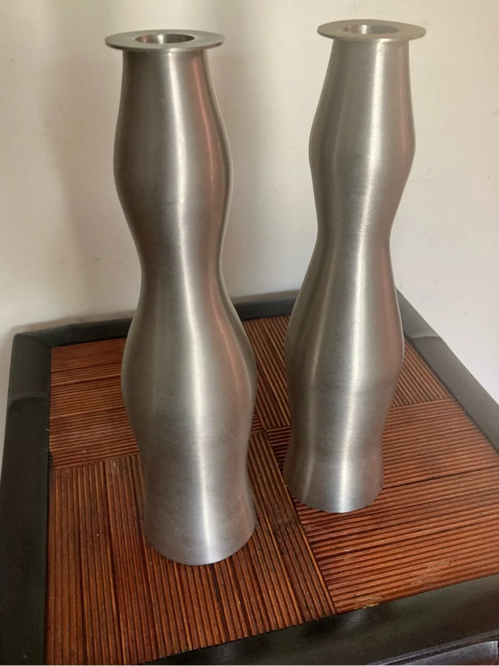 Sleek mod brushed metal candleholders. Look new
